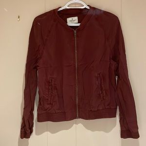 Size M maroon coloured fall jacket.